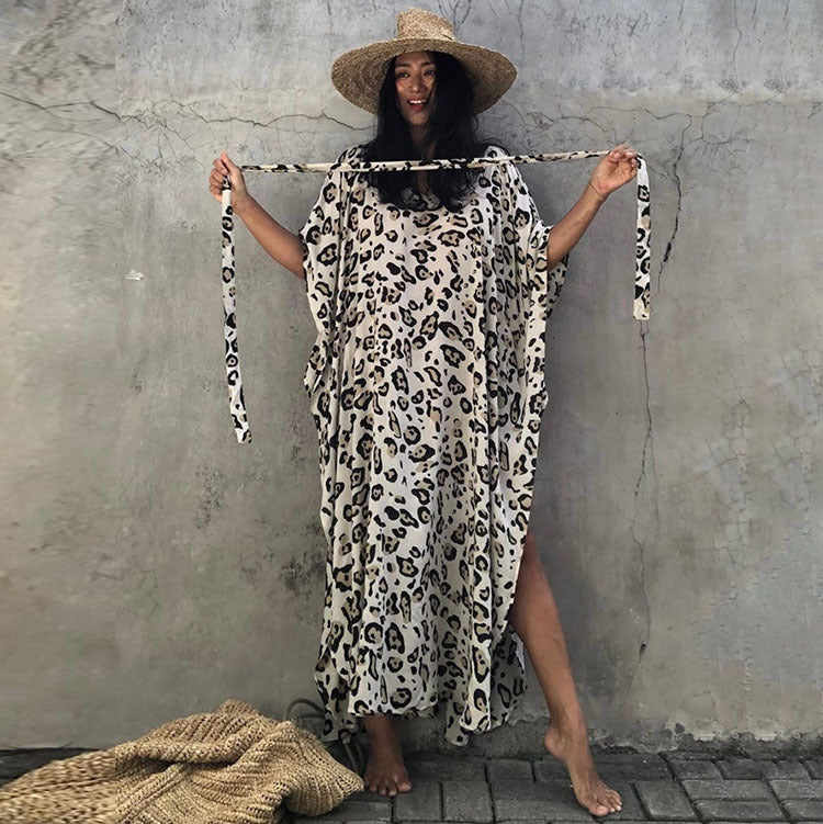Women’s maxi dress with asymmetrical cut and animal print Ivyshape