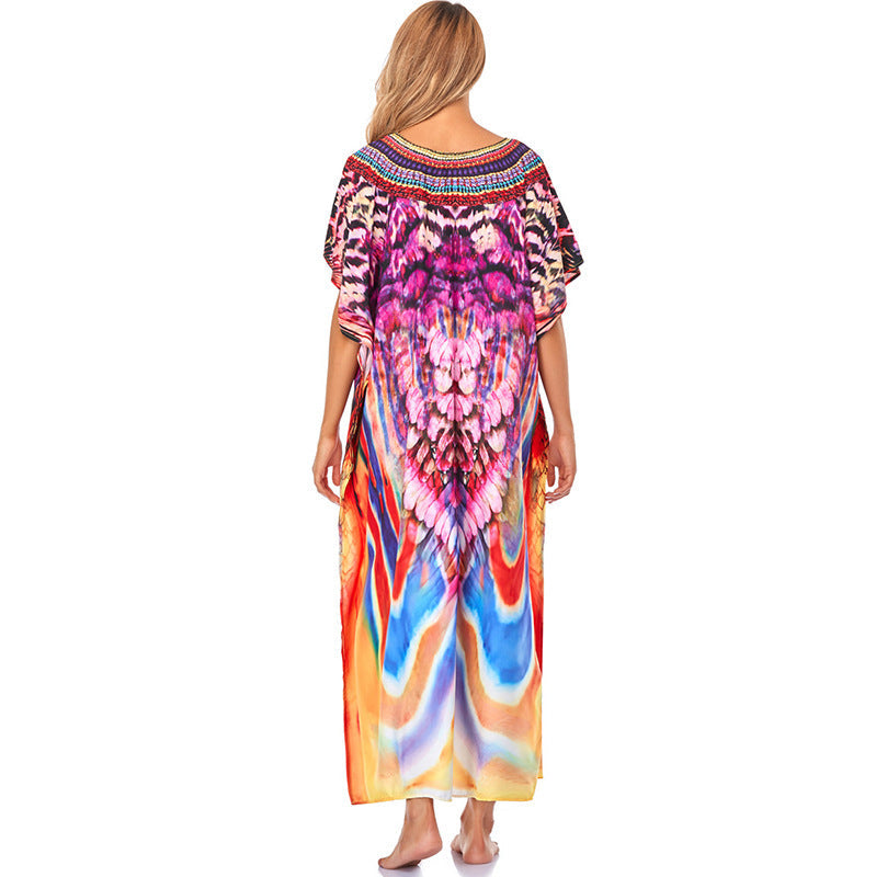 Women's beach kaftan with intricate design and colorful patterns Ivyshape