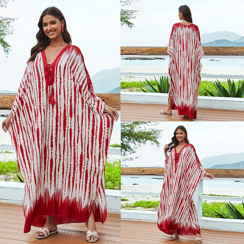 Women's beach kaftan with elegant floral design and wide silhouette Ivyshape
