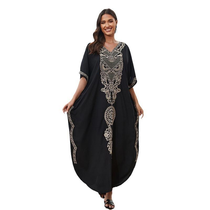 Women's beach cover-up with elegant embroidery and flowing cut Ivyshape