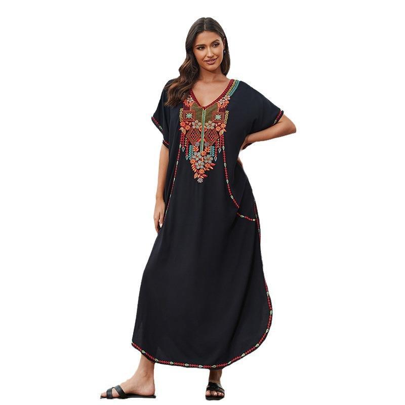 Women’s beach dress with luxurious embroidery and flowing cut Ivyshape