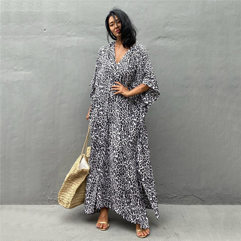 Women’s maxi dress with asymmetrical cut and animal print Ivyshape