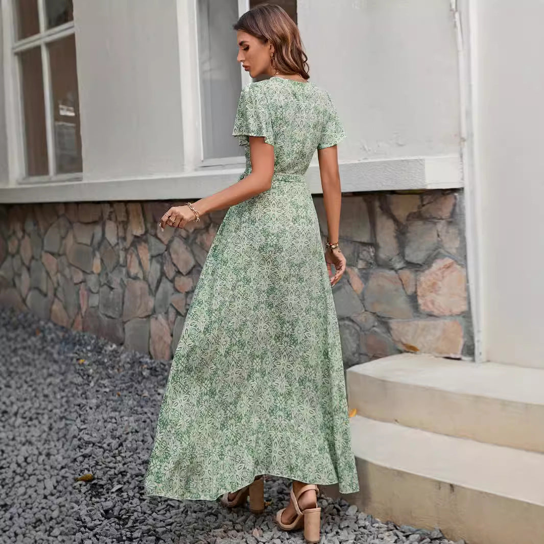 Women's maxi dress with high-cut hem and playful wrap detail Ivyshape