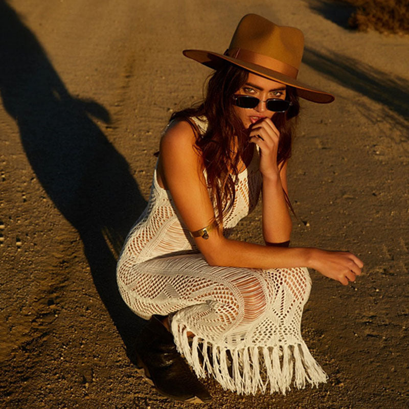Women's crochet beach dress with fringed accents and asymmetric hem Ivyshape