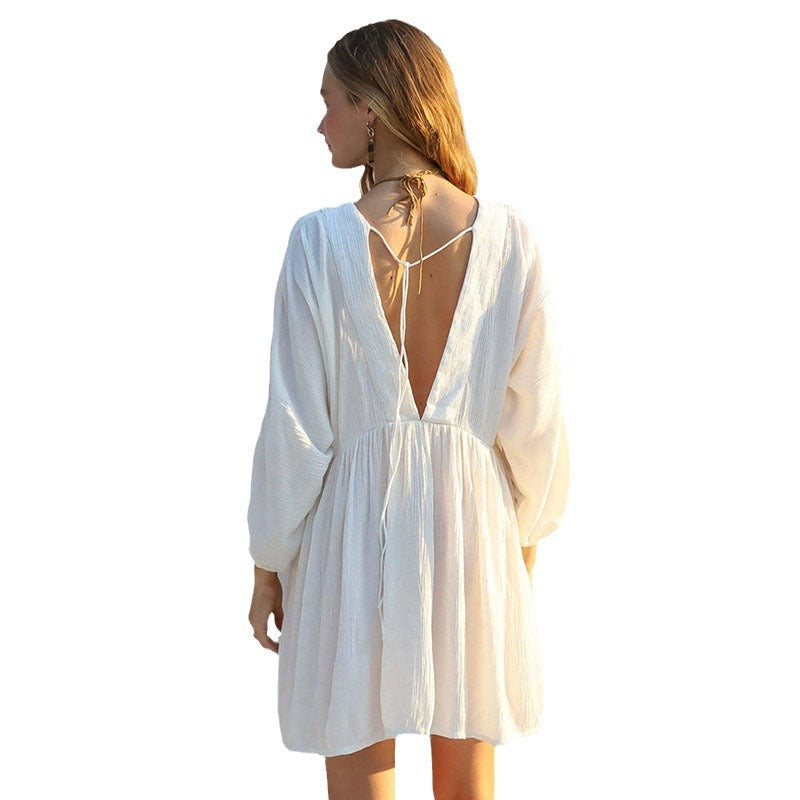 Women's casual beach dress with deep V-neckline and loose silhouette Ivyshape