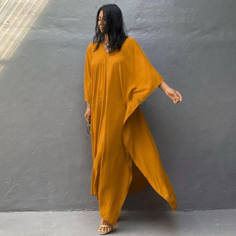 Ladies airy beach dress with V-neckline and wide sleeves Ivyshape