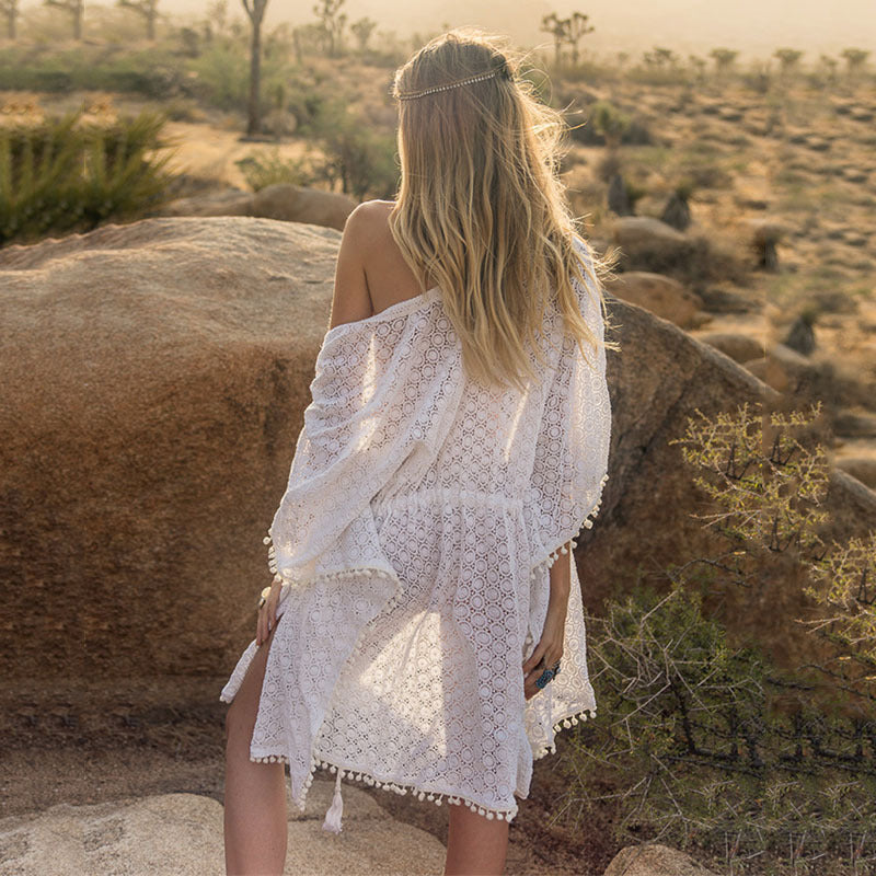 Women's elegant crochet beach cover-up with playful tassels Ivyshape