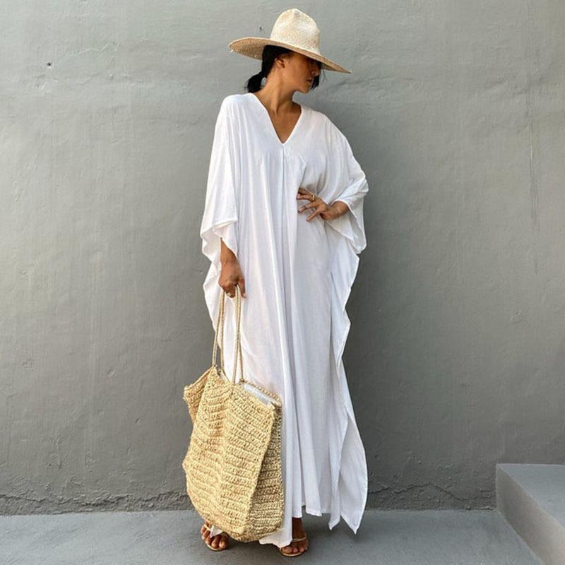 Ladies airy beach dress with V-neckline and wide sleeves Ivyshape