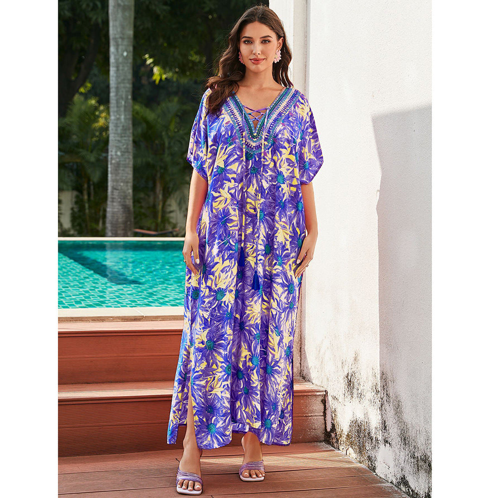 Women's maxi dress with colorful animal motif and elegant V-neck Ivyshape