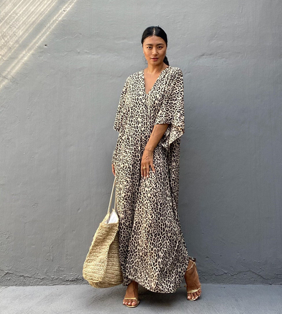 Women’s maxi dress with asymmetrical cut and animal print Ivyshape