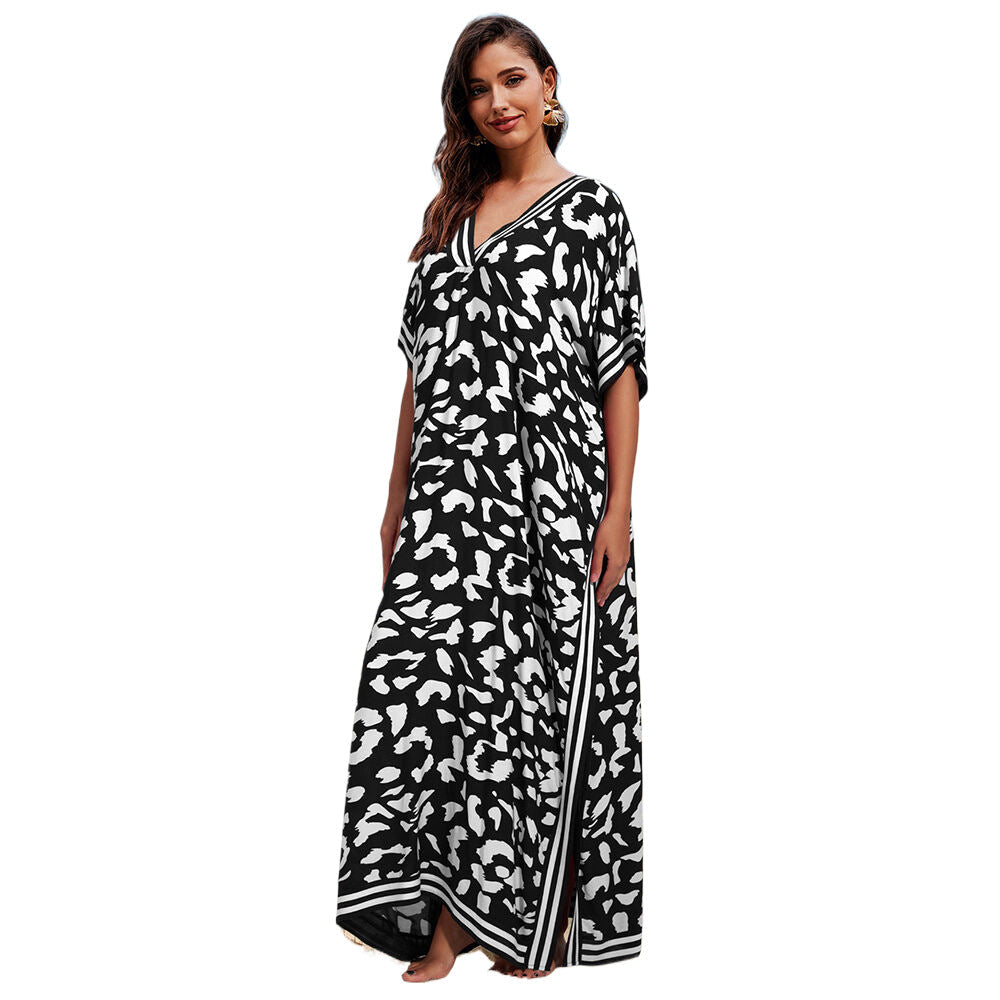 Women's maxi kaftan in a modern animal pattern with deep V-neck Ivyshape