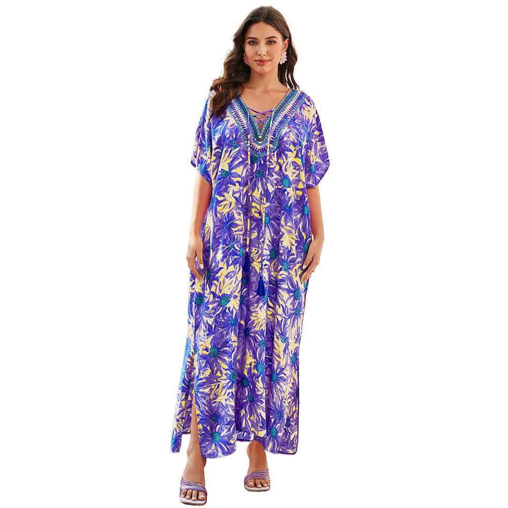 Women's maxi dress with colorful animal motif and elegant V-neck Ivyshape