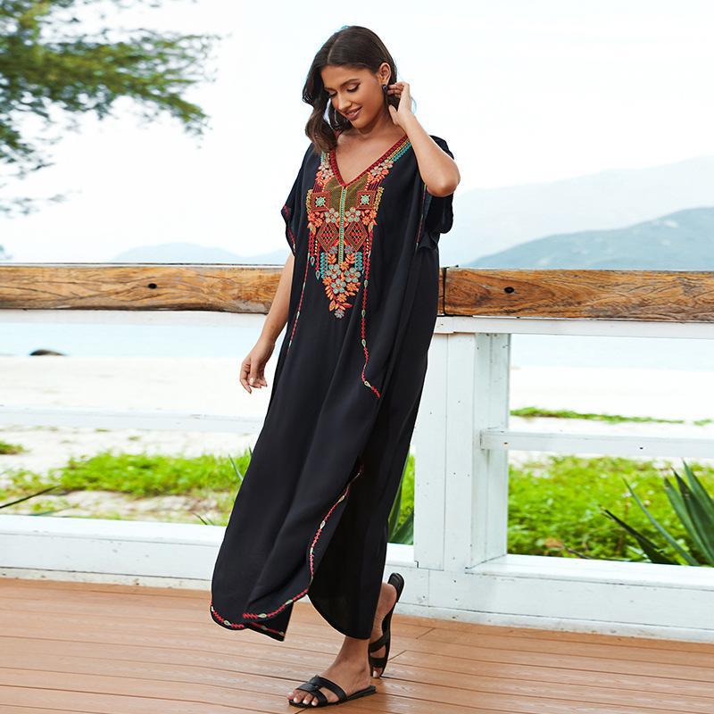 Women’s beach dress with luxurious embroidery and flowing cut Ivyshape