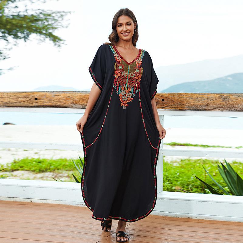 Women’s beach dress with luxurious embroidery and flowing cut Ivyshape