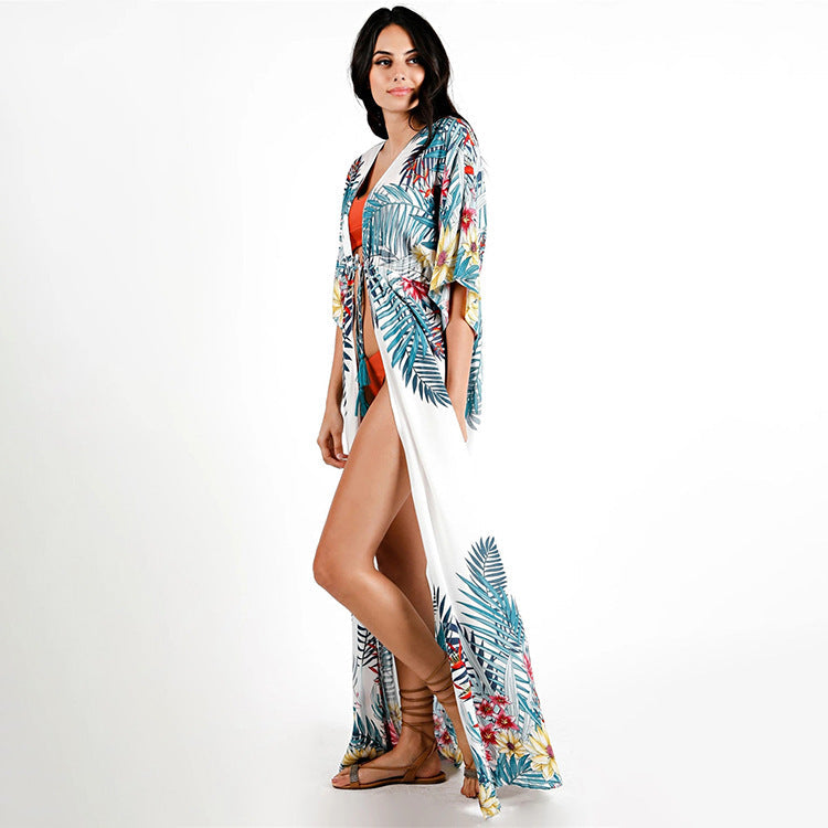 Women's beach tunic with cheerful floral pattern and loose fit Ivyshape