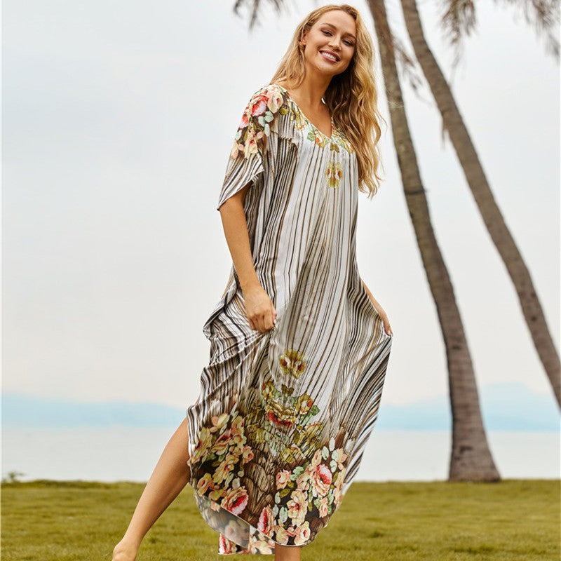 Women's beach dress with floral design and airy sleeves Ivyshape