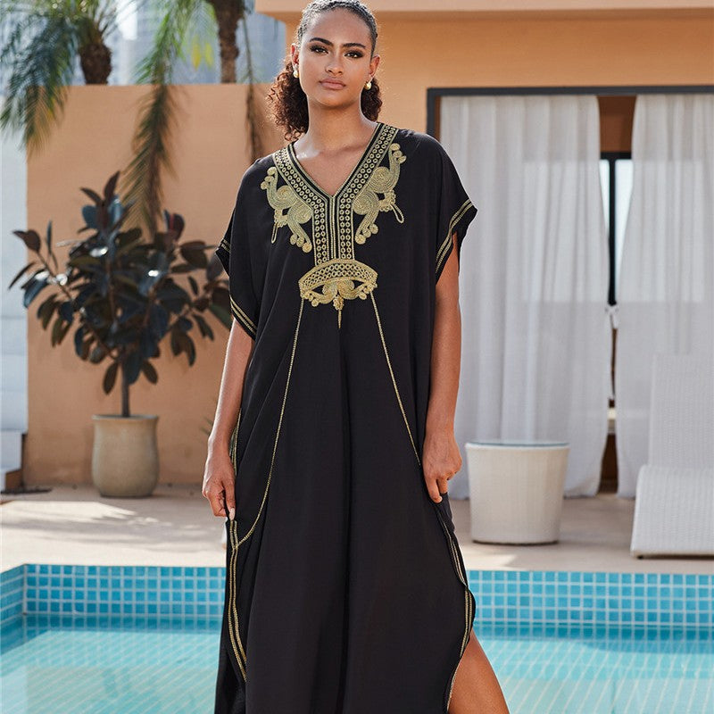 Women’s beach kaftan with intricate embroidery details and asymmetric hem Ivyshape