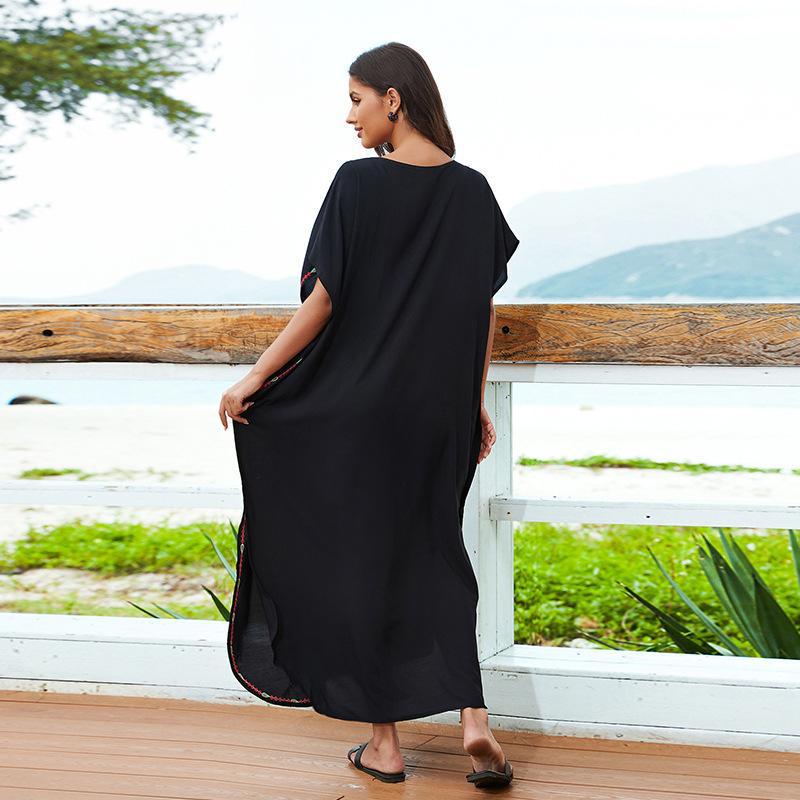 Women’s beach dress with luxurious embroidery and flowing cut Ivyshape