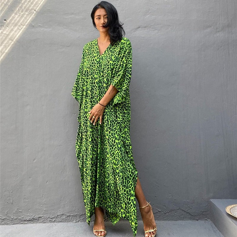 Women’s maxi dress with asymmetrical cut and animal print Ivyshape