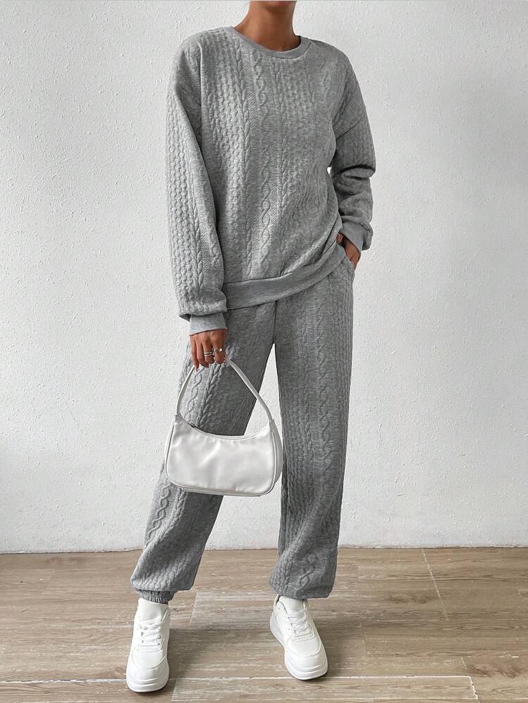 Ladies knitted suit with cable braid pattern Ivyshape