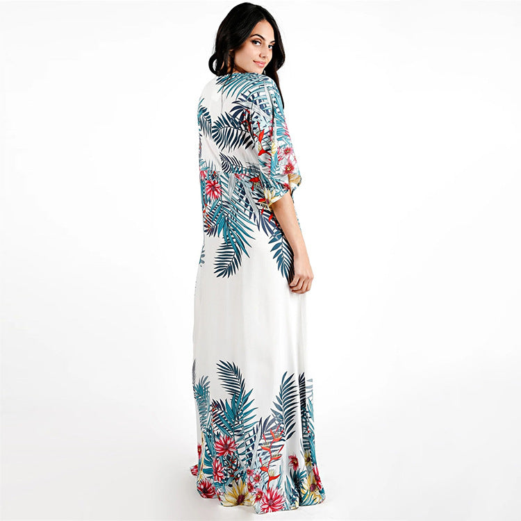 Women's beach tunic with cheerful floral pattern and loose fit Ivyshape