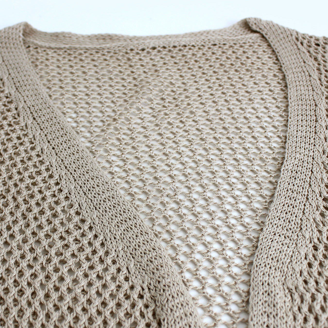 Women airy knitted cardigan with open design and practical pockets Ivyshape