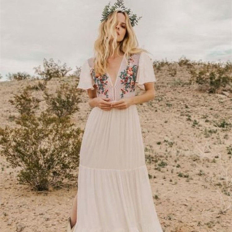 Women’s maxi dress with floral embroidery and voluminous sleeves Ivyshape