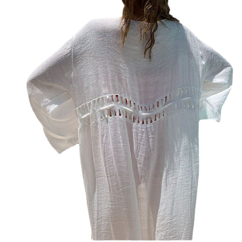 Women's beach cover-up with airy cut details Ivyshape