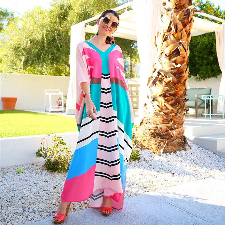 Women's beach caftan with asymmetrical color design and deep V-neck Ivyshape