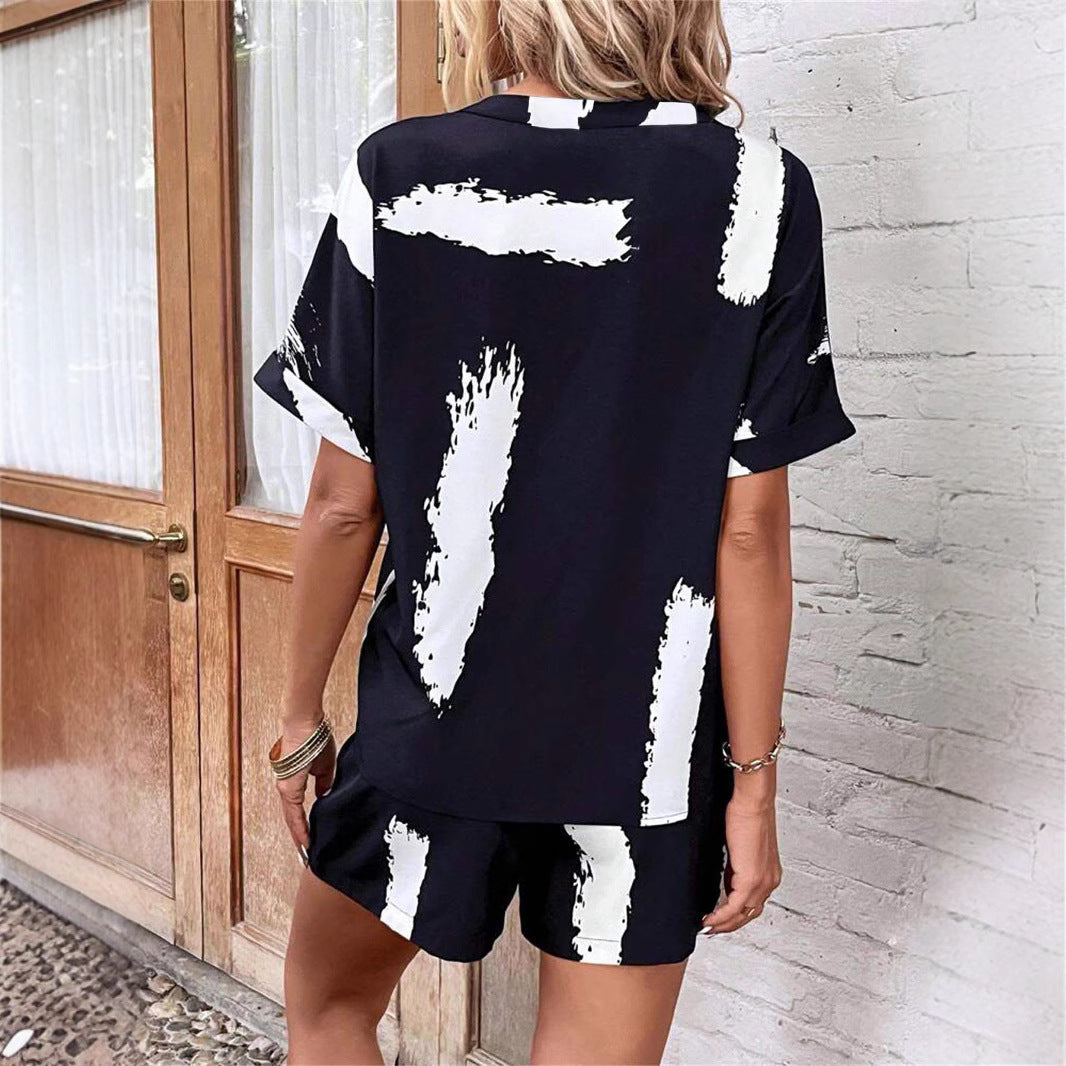Women's short-sleeve jumpsuit with modern graphic print Ivyshape