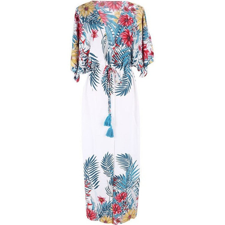 Women's beach tunic with cheerful floral pattern and loose fit Ivyshape