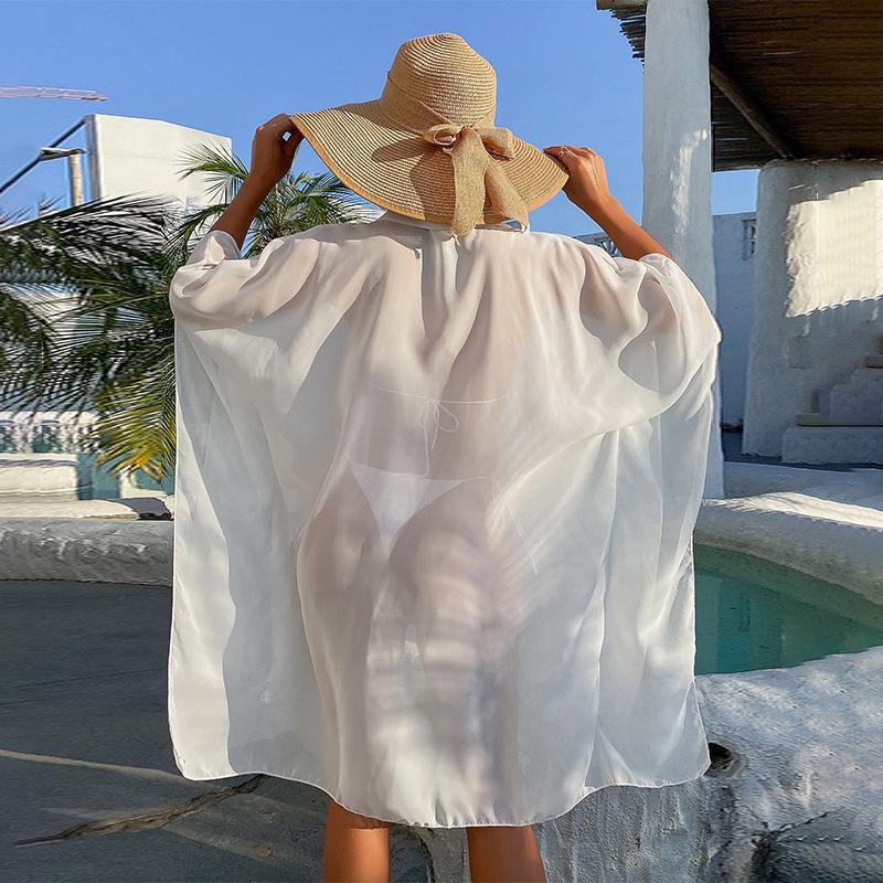 Ladies transparent beach coat with casual cut and generous sleeves Ivyshape