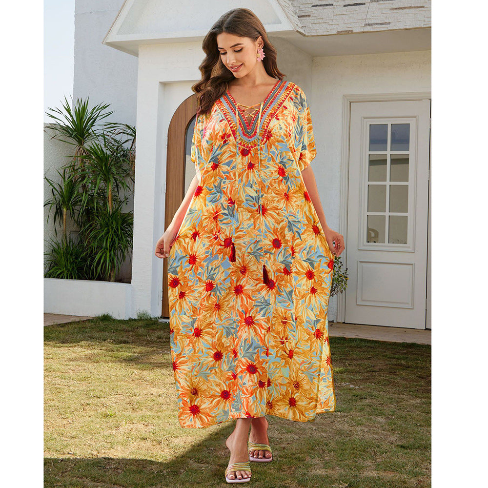 Women's maxi dress with colorful animal motif and elegant V-neck Ivyshape