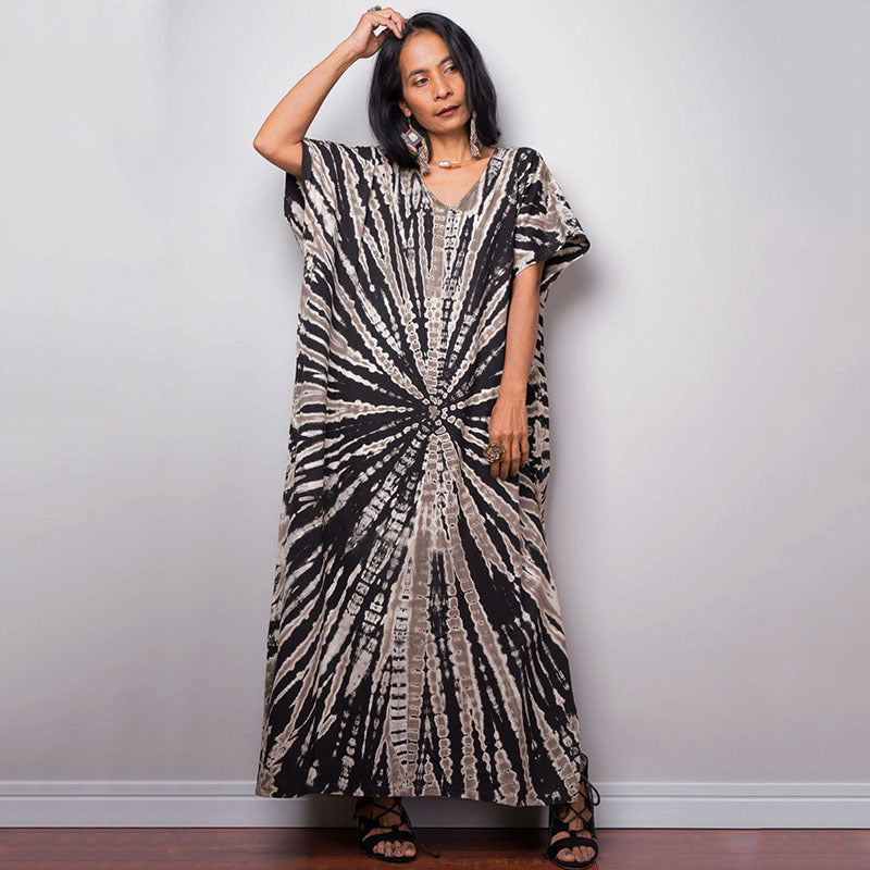 Women’s maxi dress in a colorful style with a V-neck and side slits Ivyshape