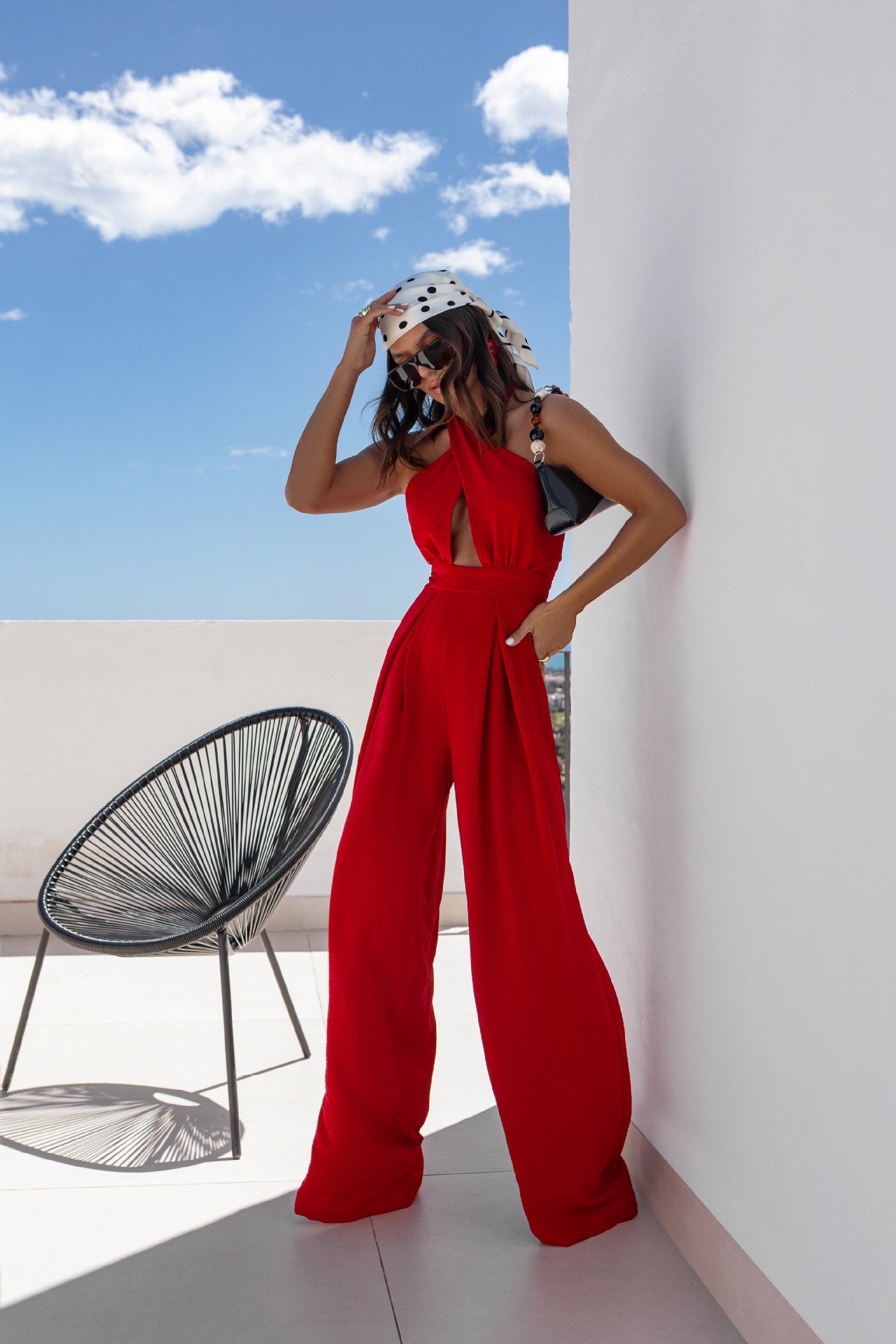 Women's jumpsuit with deep V-neck and elegant cut Ivyshape