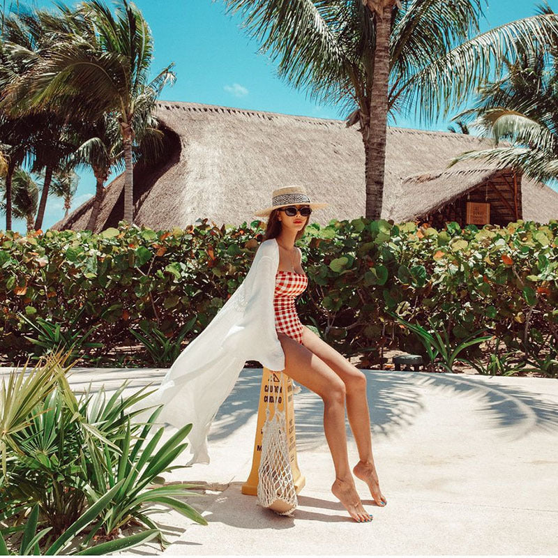 Women's beach cover-up with airy cut details Ivyshape