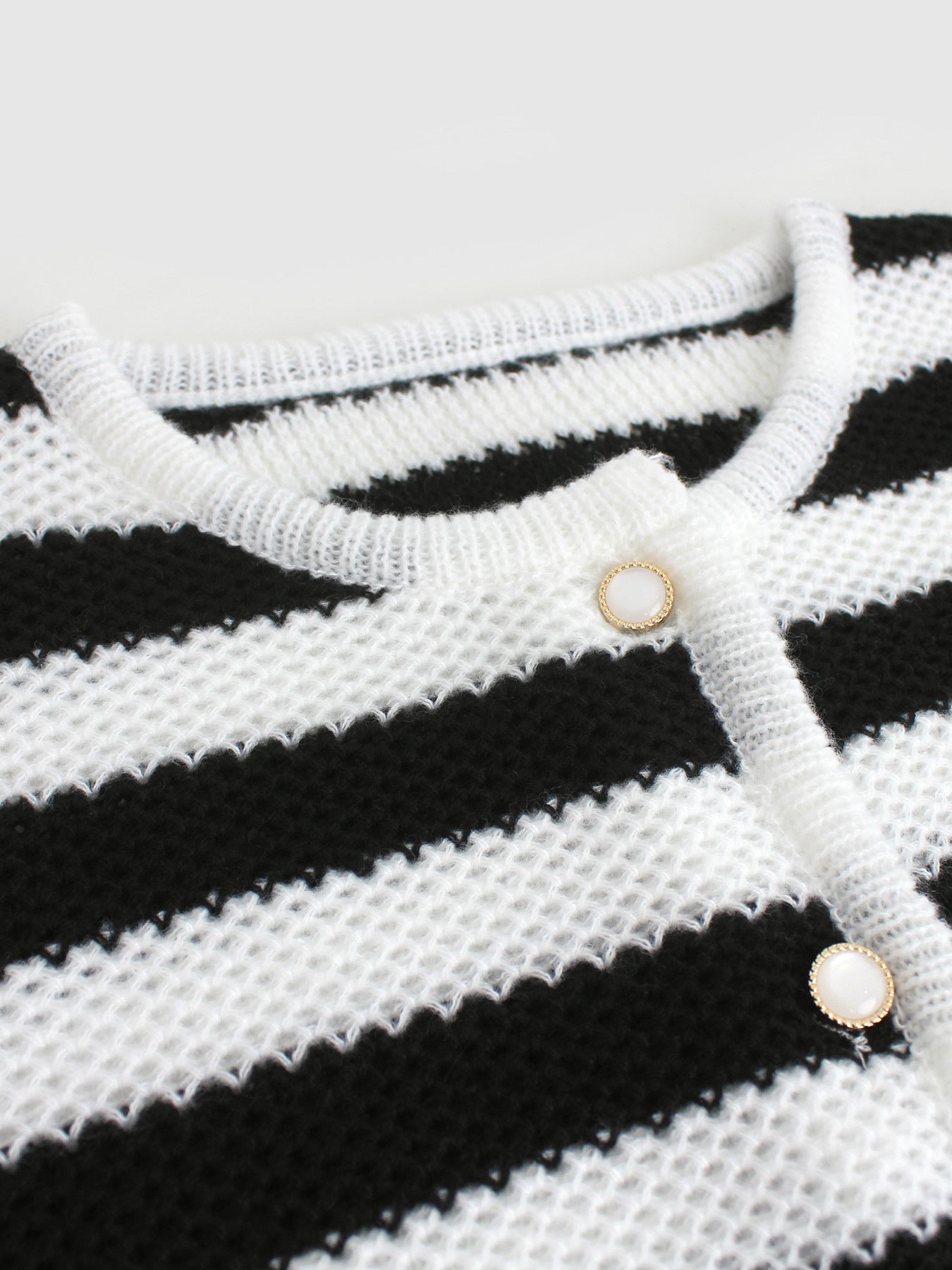 Women striped knitted cardigan with button detail and loose fit Ivyshape