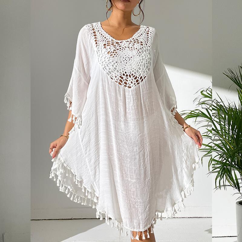 Women's lightweight beach cover-up with intricate crochet accents and fringe details Ivyshape
