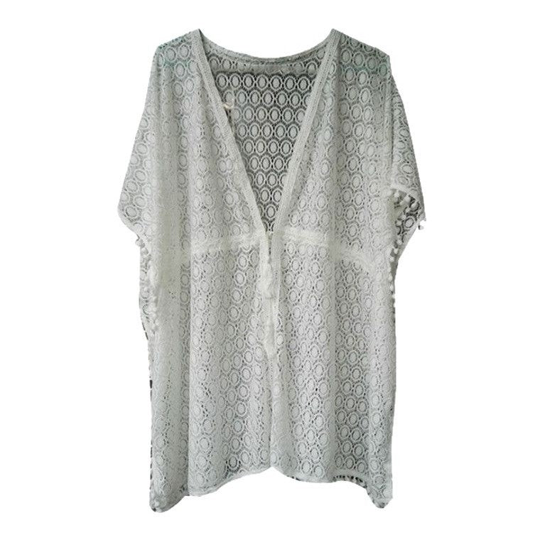 Women's elegant crochet beach cover-up with playful tassels Ivyshape