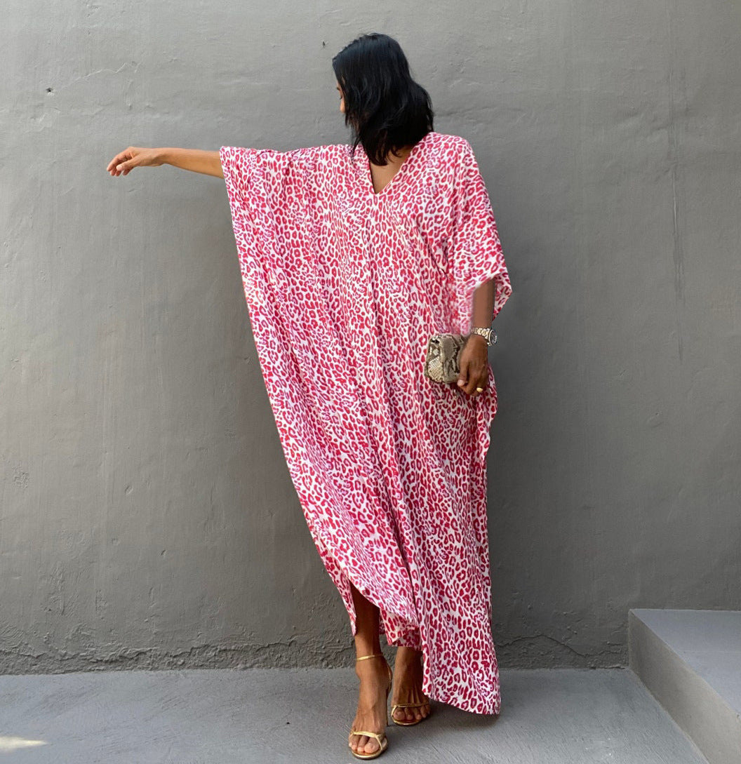 Women’s maxi dress with asymmetrical cut and animal print Ivyshape
