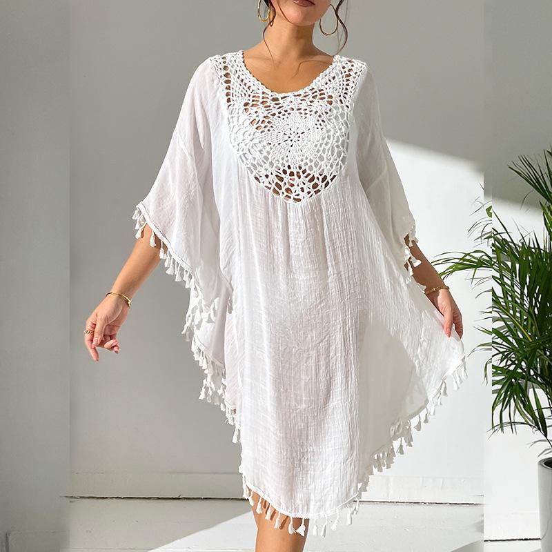 Women's lightweight beach cover-up with intricate crochet accents and fringe details Ivyshape