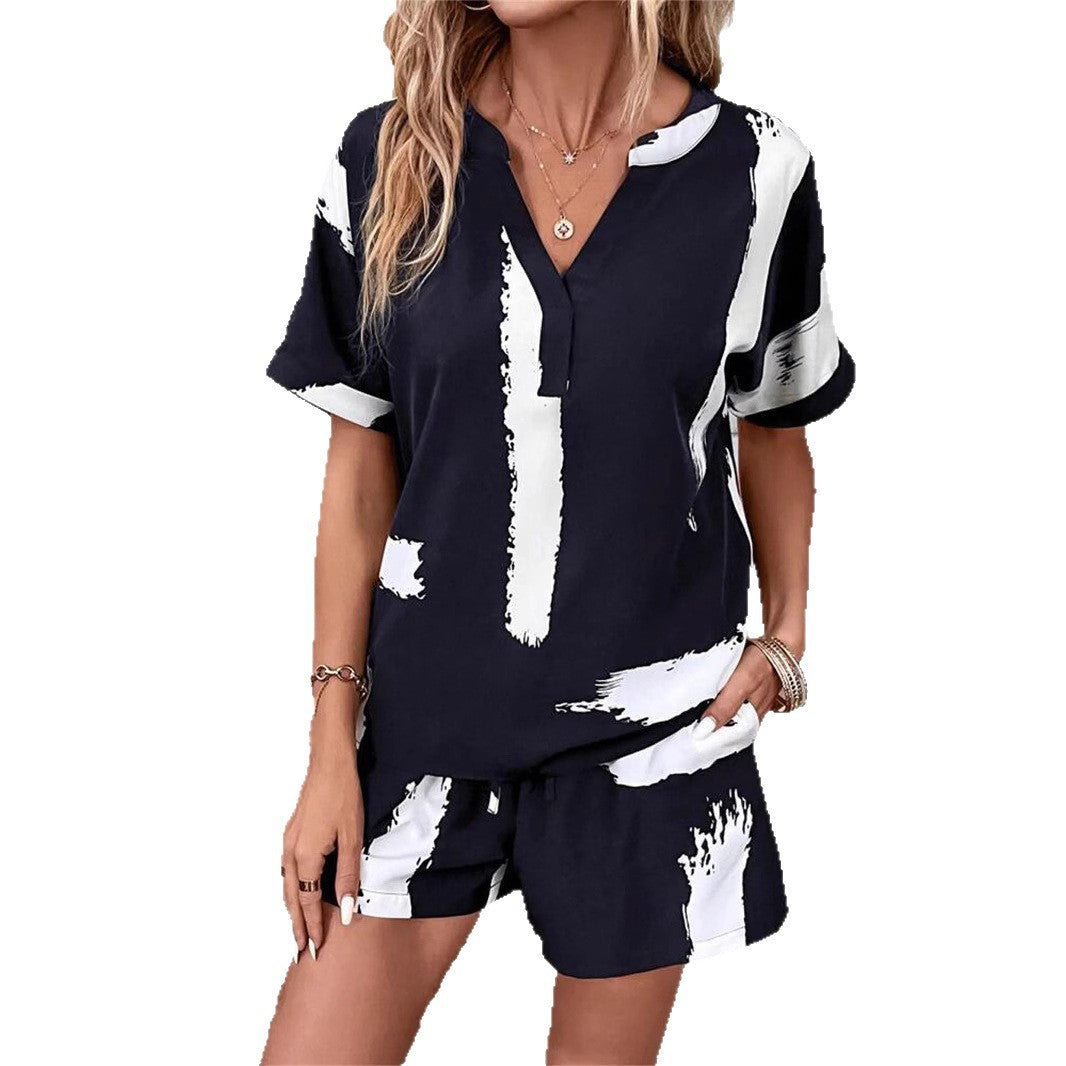 Women's short-sleeve jumpsuit with modern graphic print Ivyshape