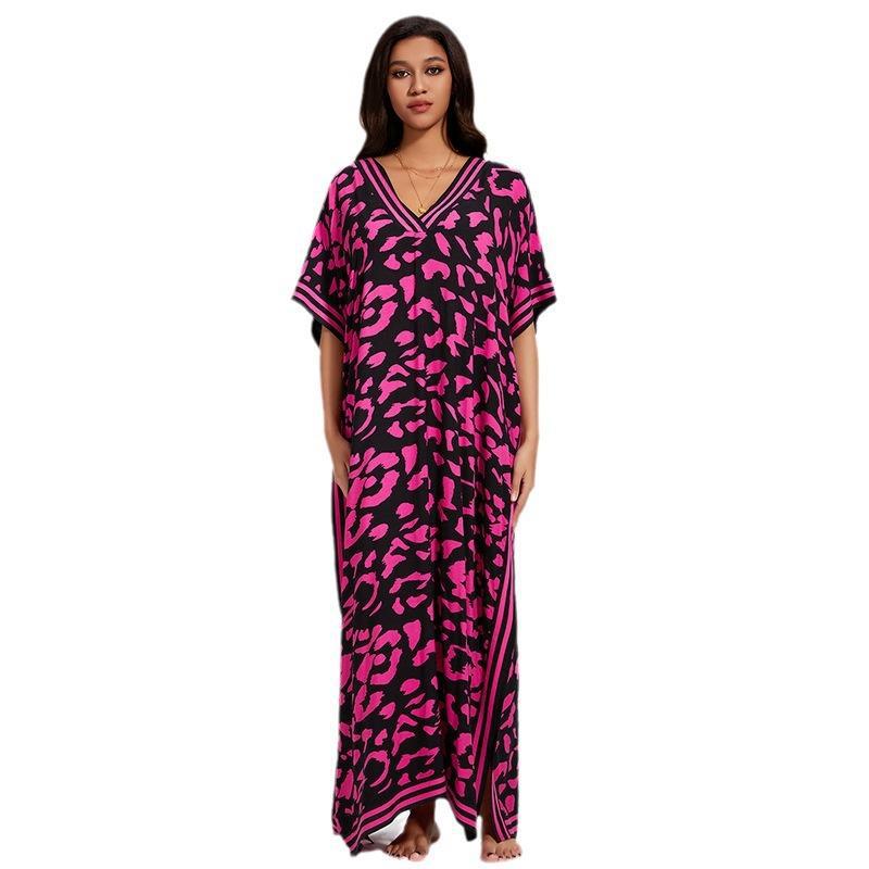 Women's maxi kaftan in a modern animal pattern with deep V-neck Ivyshape