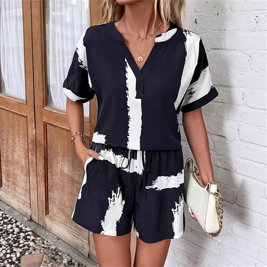 Women's short-sleeve jumpsuit with modern graphic print Ivyshape