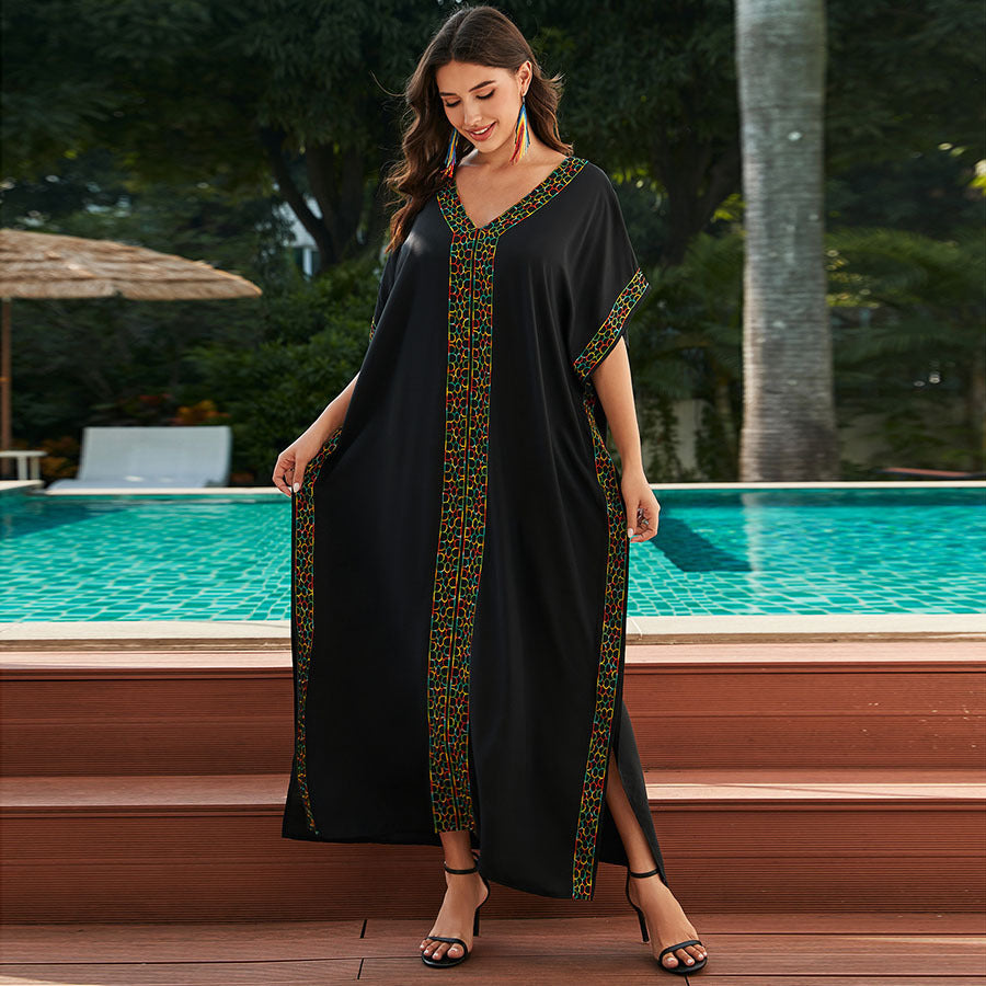 Women elegant kaftan dress with colorful embroideries Ivyshape