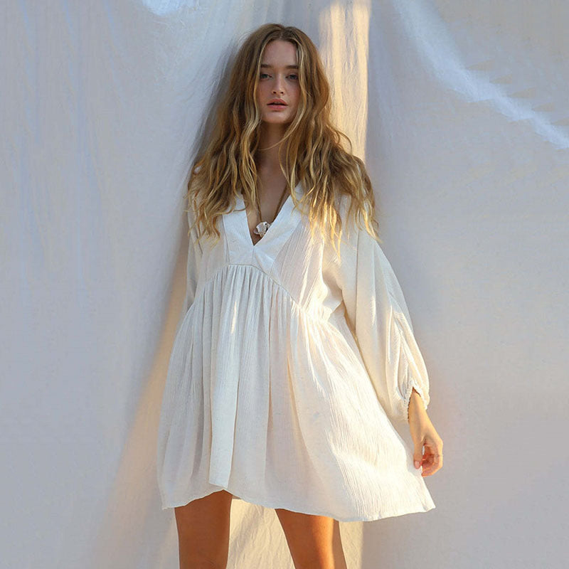 Women's casual beach dress with deep V-neckline and loose silhouette Ivyshape