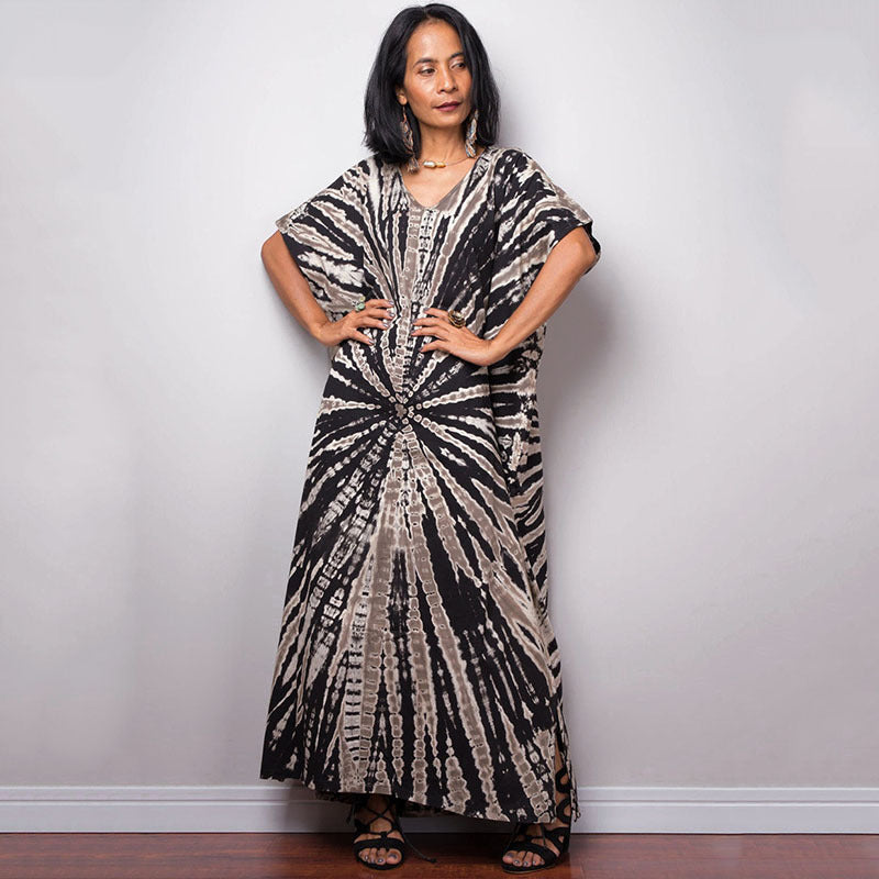Women’s maxi dress in a colorful style with a V-neck and side slits Ivyshape