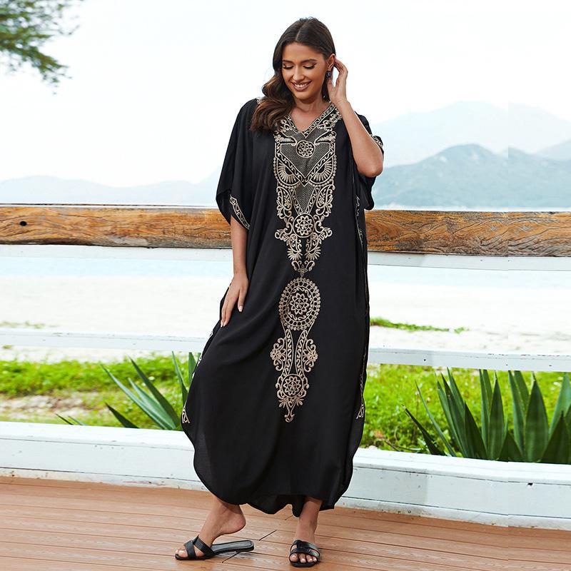 Women's beach cover-up with elegant embroidery and flowing cut Ivyshape