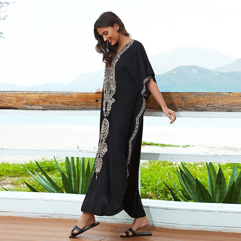 Women's beach cover-up with elegant embroidery and flowing cut Ivyshape