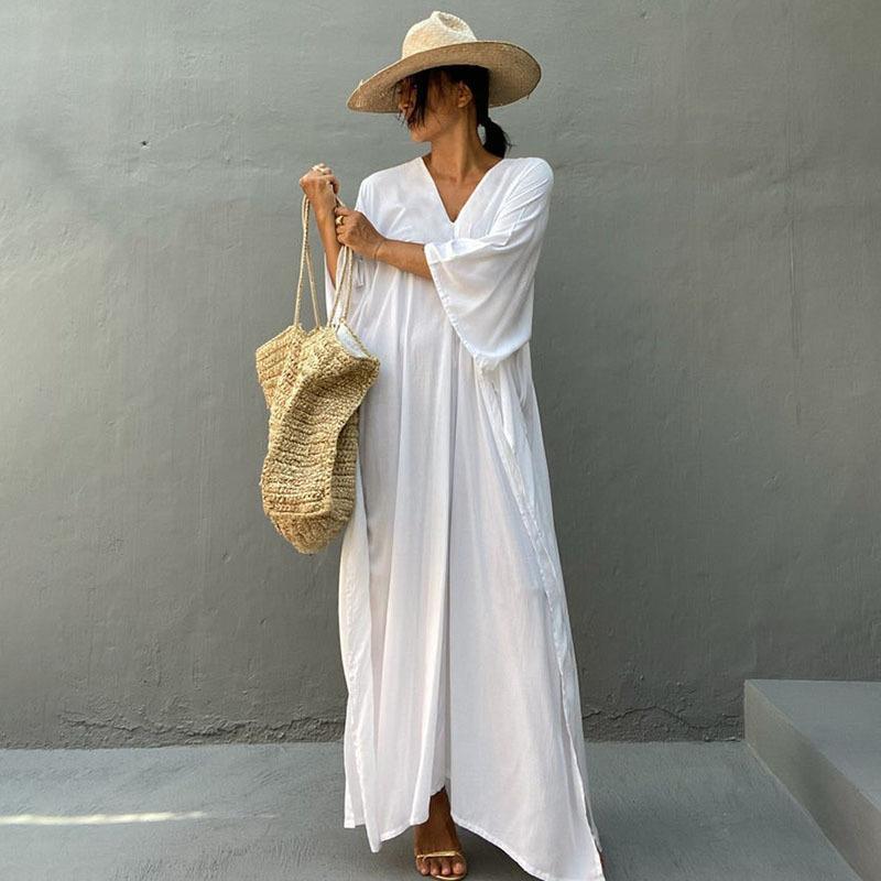 Ladies airy beach dress with V-neckline and wide sleeves Ivyshape